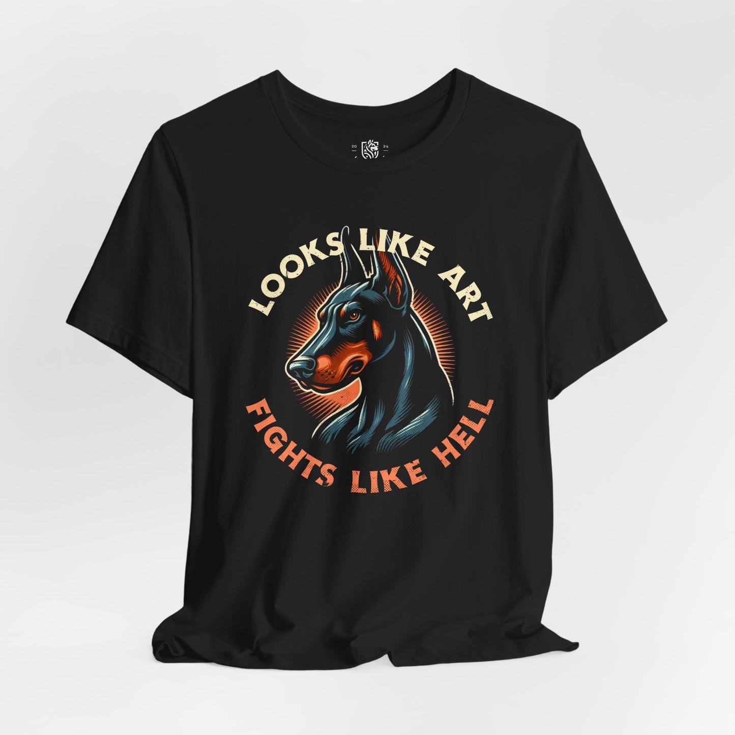 Doberman – Looks Like Art. Fights Like Hell.